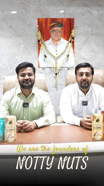 Notty Nuts founders with branded products